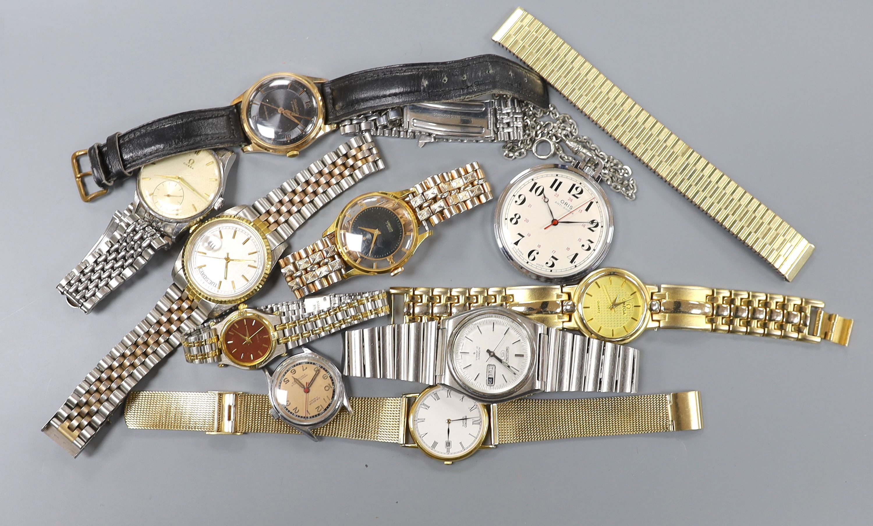 A gentleman's mid 20th century stainless steel Omega manual wrist watch, case diameter 35mm, on associated bracelet, together with eight other assorted wrist watches including Seiko and Silvan, an Oris pocket watch and t